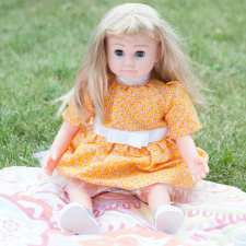 blonde doll in yellow dress