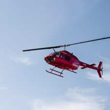 helicopter flying over house