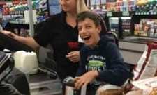 special needs boy laughing