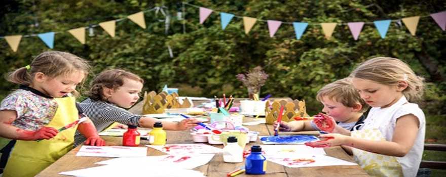 kids doing crafts outdoors