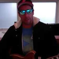 adam sandler with guitar