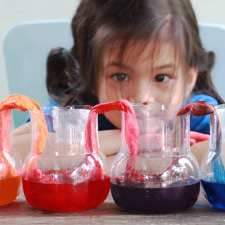 kid doing science experiment