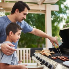 father and son grilling