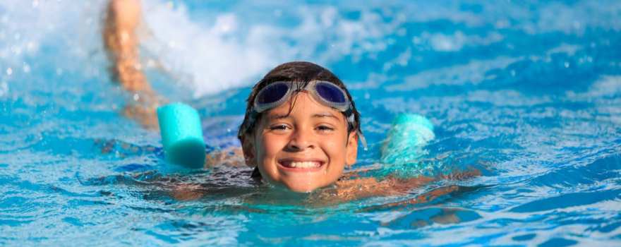 happy boy in pool