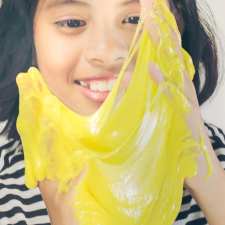 girl playing with slime