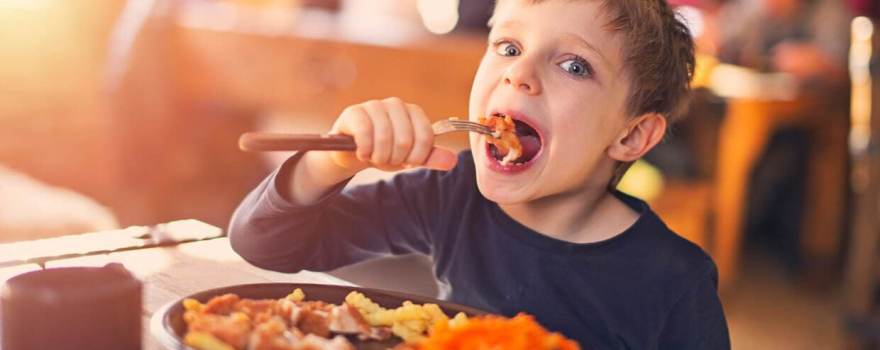 kid stuffing his face