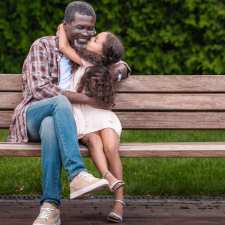 girl kissing grandpa