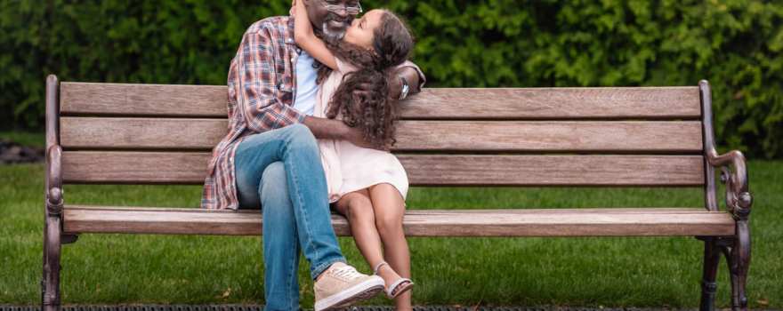 girl kissing grandpa