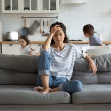 Stressed mom on couch