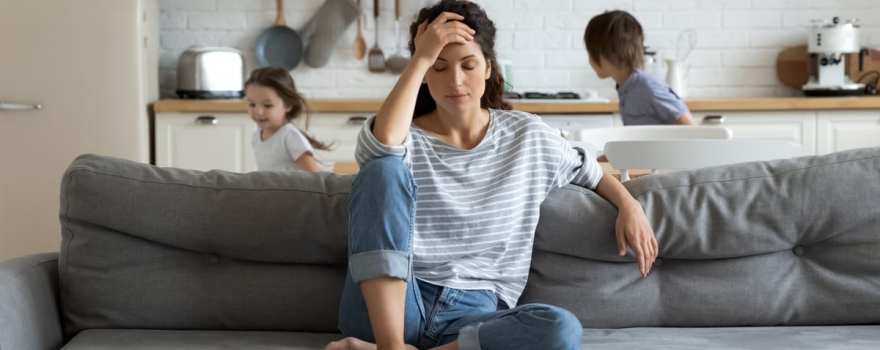 Stressed mom on couch