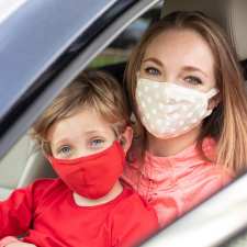 mom and son in face masks