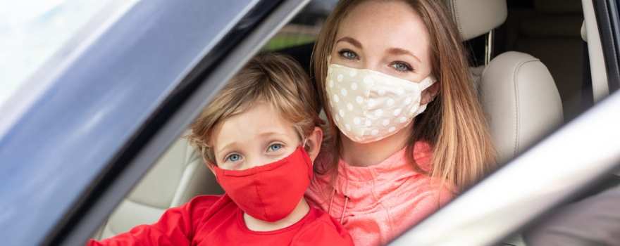 mom and son in face masks