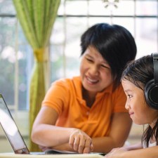 Mom and daughter on computer