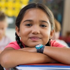 Girl in school with books