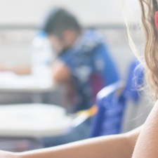 kids in masks taking tests