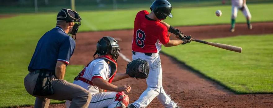 baseball players at home plate