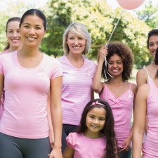 women in pink shirts at a fundraiser