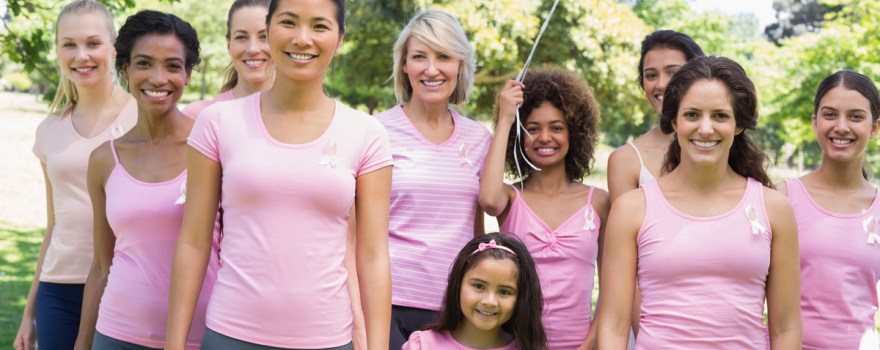 women in pink shirts at a fundraiser