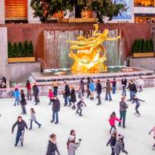 people ice skating at the rink at rockefeller center