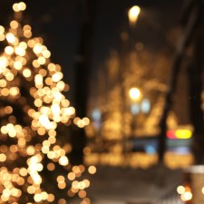 Twinkling white Christmas Tree at night