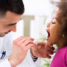 kid at doctor checkup to boost immune system