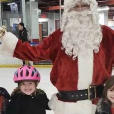 christmas ice skating event with santa