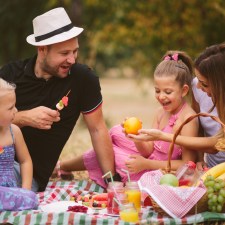 family outside on a picnic