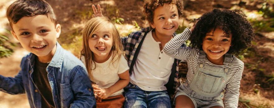 Kids in the woods acting goofy