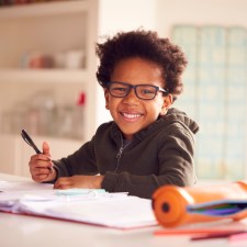 boy reading and studying at home