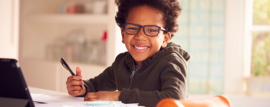 boy reading and studying at home