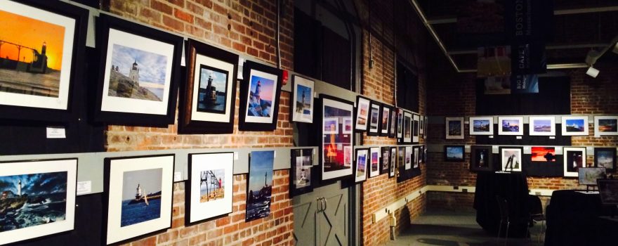 photographs of lighthouses on the wall