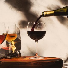 red wine being poured into glasses