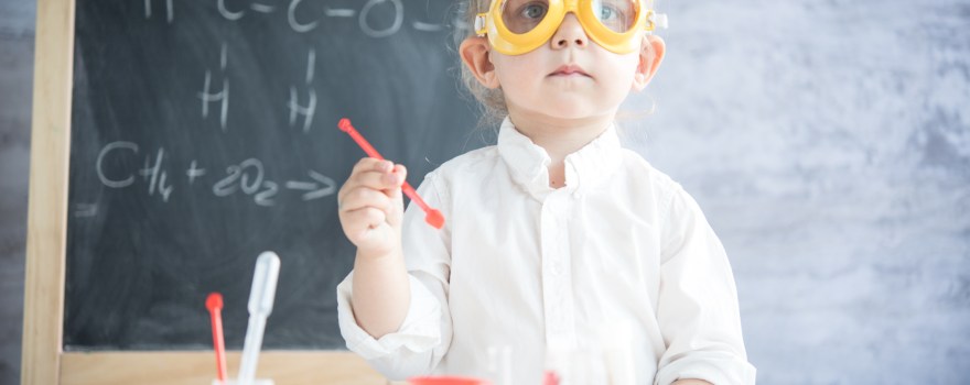 child doing science experiments