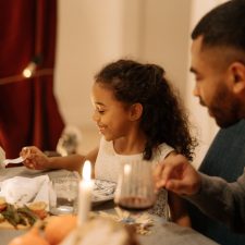 Family enjoying Thanksgiving dinner.