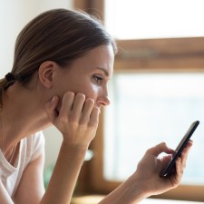 Woman looking at her phone.