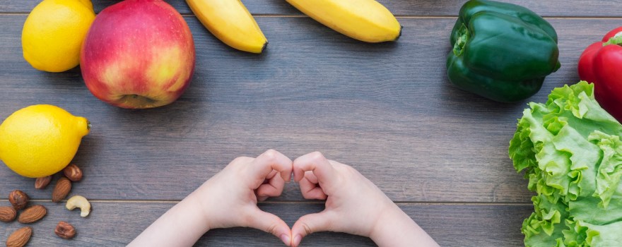 an array of healthy foods, which are part of NYC's plan for improving food education in NYC schools, spread out on a table