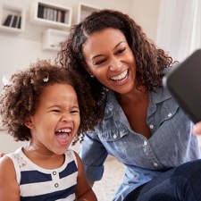 mother and child laughing together