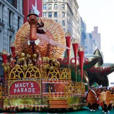 a float with a turkey theme that is part of the Macy's Thanksgiving Day Parade