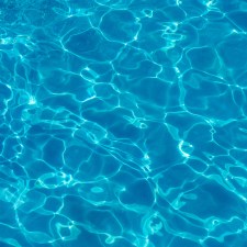 closeup water floating swimming pool